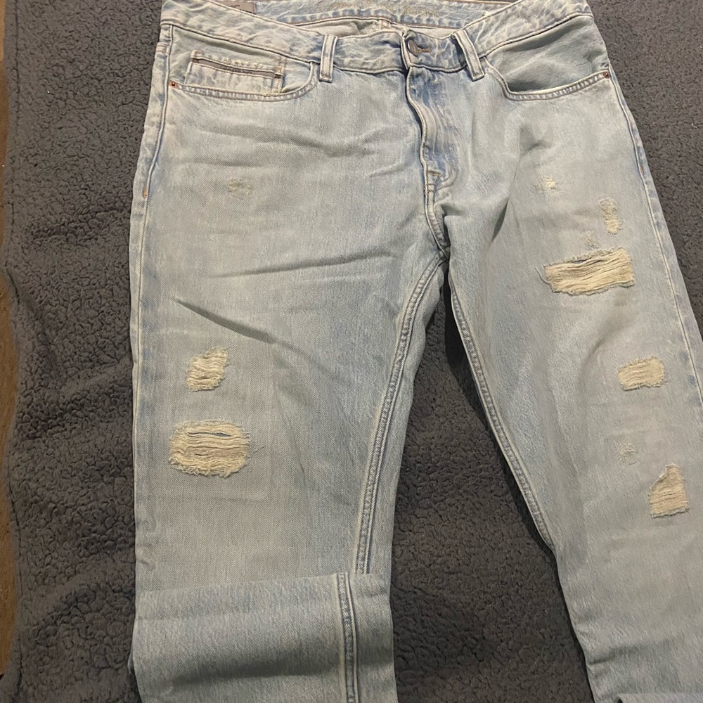 Calvin Klein Rip jeans slim fit  only worn once in great condition